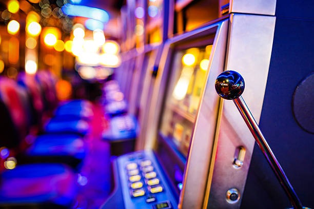 Live game show studio with host and interactive wheel display